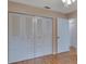 Bedroom with built-in double door closet at 47 Villa Villar Ct # 470, Deland, FL 32724