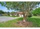 Front view of house with landscaping and parking at 47 Villa Villar Ct # 470, Deland, FL 32724