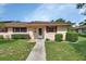 Front view of charming single story home at 47 Villa Villar Ct # 470, Deland, FL 32724