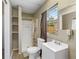 Clean bathroom with shower/tub combo and updated vanity at 2300 Calloway Dr, Orlando, FL 32810