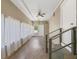 Sunroom with hardwood floors, white curtains and ceiling fan at 2300 Calloway Dr, Orlando, FL 32810