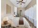 Main bedroom with a queen-size bed, side table, and large windows at 2300 Calloway Dr, Orlando, FL 32810
