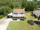 Aerial view of house with detached garage at 4205 Quail Ranch Rd, New Smyrna Beach, FL 32168