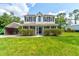 Two story house with large front yard at 4205 Quail Ranch Rd, New Smyrna Beach, FL 32168