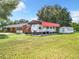 Ranch home with covered RV parking and shed at 106 N Frederick St, Pierson, FL 32180