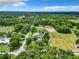 High-angle view of a house with surrounding farmlands at 106 N Frederick St, Pierson, FL 32180
