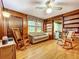 Cozy living room with hardwood floors and built-in shelving at 106 N Frederick St, Pierson, FL 32180