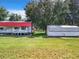 Aerial view showing RV cover and storage shed at 106 N Frederick St, Pierson, FL 32180