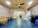 Sunroom with sliding barn doors leading to laundry area at 106 N Frederick St, Pierson, FL 32180