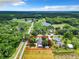 Aerial view showcasing a house nestled in a rural landscape at 106 N Frederick St, Pierson, FL 32180