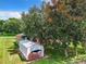 Aerial view of the property with large trees at 106 N Frederick St, Pierson, FL 32180