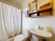 Clean bathroom with a shower/tub combo and vanity at 106 N Frederick St, Pierson, FL 32180