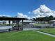 Community boat docks with multiple slips at 1612 Juno Trl, Astor, FL 32102