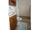 Clean bathroom with shower stall, toilet and vanity at 1612 Juno Trl, Astor, FL 32102