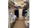 Spacious closet with shelving and hanging rods at 1612 Juno Trl, Astor, FL 32102