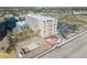 Aerial view of building, pool, and beach access at 2043 S Atlantic Ave # 308, Daytona Beach, FL 32118