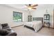Bedroom with ceiling fan and wood accents at 1582 Covered Bridge Dr, Deland, FL 32724