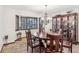 Formal dining room with chandelier and wooden table at 1582 Covered Bridge Dr, Deland, FL 32724