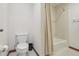 Simple bathroom with a shower/tub combo and toilet at 1582 Covered Bridge Dr, Deland, FL 32724