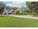 Two-story house with attached garage and a large yard at 1582 Covered Bridge Dr, Deland, FL 32724