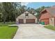 Two-car attached garage with additional detached garage at 1582 Covered Bridge Dr, Deland, FL 32724