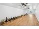 Large bonus room with hardwood floors and abundant natural light at 1582 Covered Bridge Dr, Deland, FL 32724