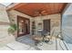 Covered patio with seating for dining, adjacent to the house at 1582 Covered Bridge Dr, Deland, FL 32724