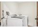 Laundry room with washer and dryer in a bright space at 1582 Covered Bridge Dr, Deland, FL 32724