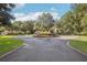 A circular driveway leading to a two-story home at 1582 Covered Bridge Dr, Deland, FL 32724