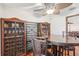 Casual dining area with wooden table and wine storage at 1582 Covered Bridge Dr, Deland, FL 32724