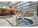 Inviting pool and spa area with screened enclosure at 1582 Covered Bridge Dr, Deland, FL 32724