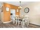 Bright dining area with table and chairs, adjacent to kitchen at 2711 N Halifax Ave # 296, Daytona Beach, FL 32118