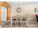 Simple dining area with wood floors and a chandelier at 2711 N Halifax Ave # 296, Daytona Beach, FL 32118