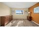 Bedroom with water views, two-tone walls, and hardwood floors at 2711 N Halifax Ave # 296, Daytona Beach, FL 32118