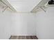 Large walk-in closet with double hanging rods at 2711 N Halifax Ave # 296, Daytona Beach, FL 32118