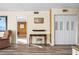 Bright home office features built-in shelving and hardwood flooring at 2711 N Halifax Ave # 296, Daytona Beach, FL 32118