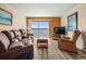 Spacious living room with water views and comfortable seating at 2711 N Halifax Ave # 296, Daytona Beach, FL 32118