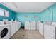 Convenient shared laundry room with multiple washer/dryers at 2711 N Halifax Ave # 296, Daytona Beach, FL 32118