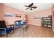 Relaxing common area with seating, bookshelves and ceiling fan at 2711 N Halifax Ave # 296, Daytona Beach, FL 32118