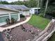 Large backyard with shed and walkway at 1871 Riveredge Dr, Astor, FL 32102