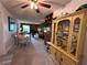 Dining area with table and chairs, and a view into living room at 1871 Riveredge Dr, Astor, FL 32102