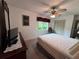Cozy bedroom with a comfortable bed and window view at 1871 Riveredge Dr, Astor, FL 32102