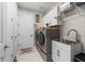 Laundry room with washer, dryer and utility sink at 259 Cherokee Hill Ct, Deland, FL 32724