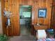 View into kitchen from dining room, featuring white cabinets at 1415 Talton Ave, Deland, FL 32720