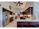 Spacious kitchen with stainless steel appliances and dark wood cabinets at 111 Fleming Ave, Port Orange, FL 32127