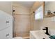 Clean bathroom with a shower/tub combo and modern vanity at 111 Fleming Ave, Port Orange, FL 32127