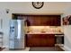 Kitchen with stainless steel appliances and wine cooler at 111 Fleming Ave, Port Orange, FL 32127