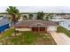 Single-Gathering home with brick facade and a two-car garage at 22 Morning Star Ave, Ormond Beach, FL 32176