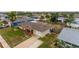 An aerial view of a single-Gathering home with a yard and driveway at 22 Morning Star Ave, Ormond Beach, FL 32176