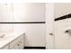 Clean bathroom with white tile and a vanity at 22 Morning Star Ave, Ormond Beach, FL 32176